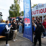 Le stand Huiles Berliet au côté de Renault Trucks au Grand Prix Camions du Mans